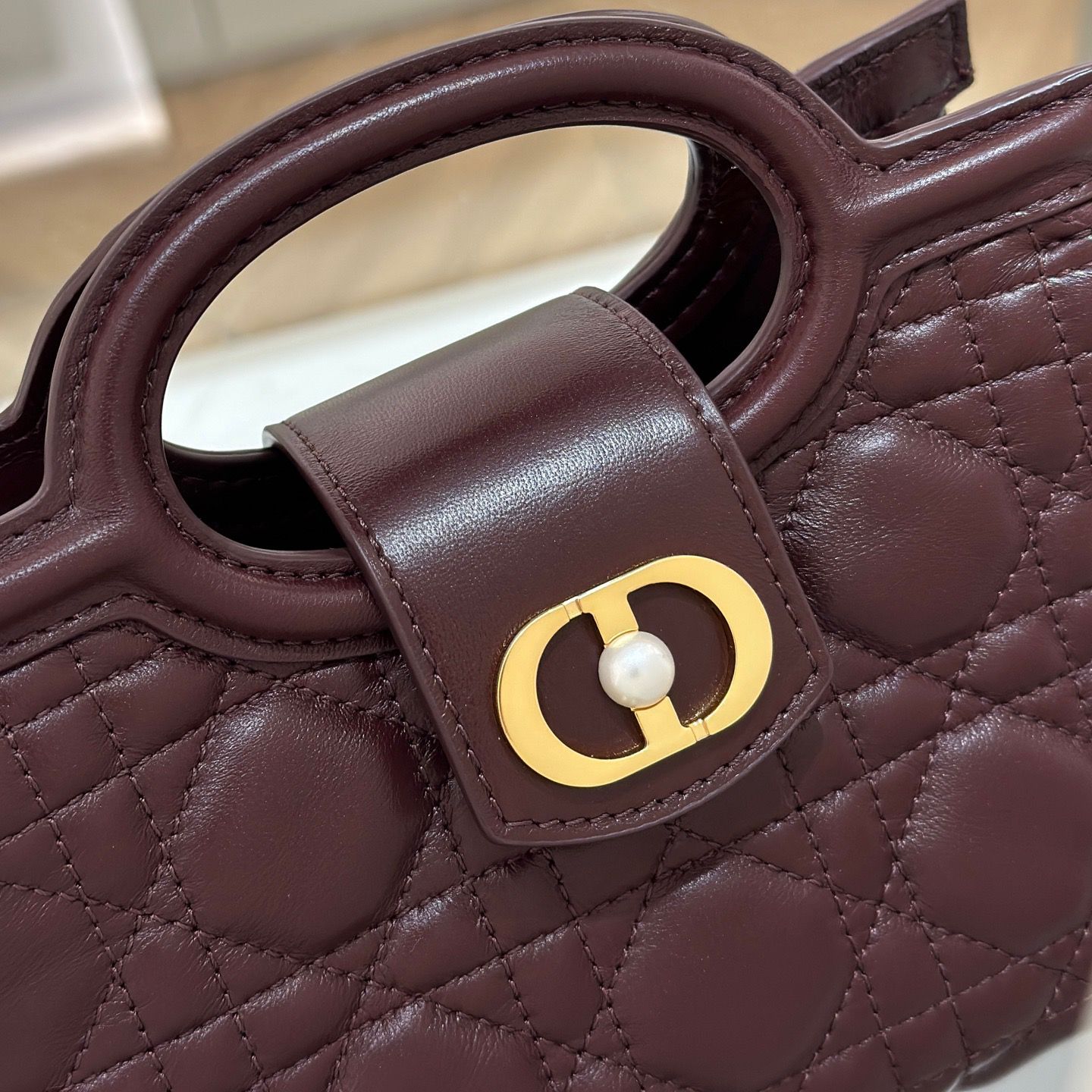 Jolie top handle mini bag