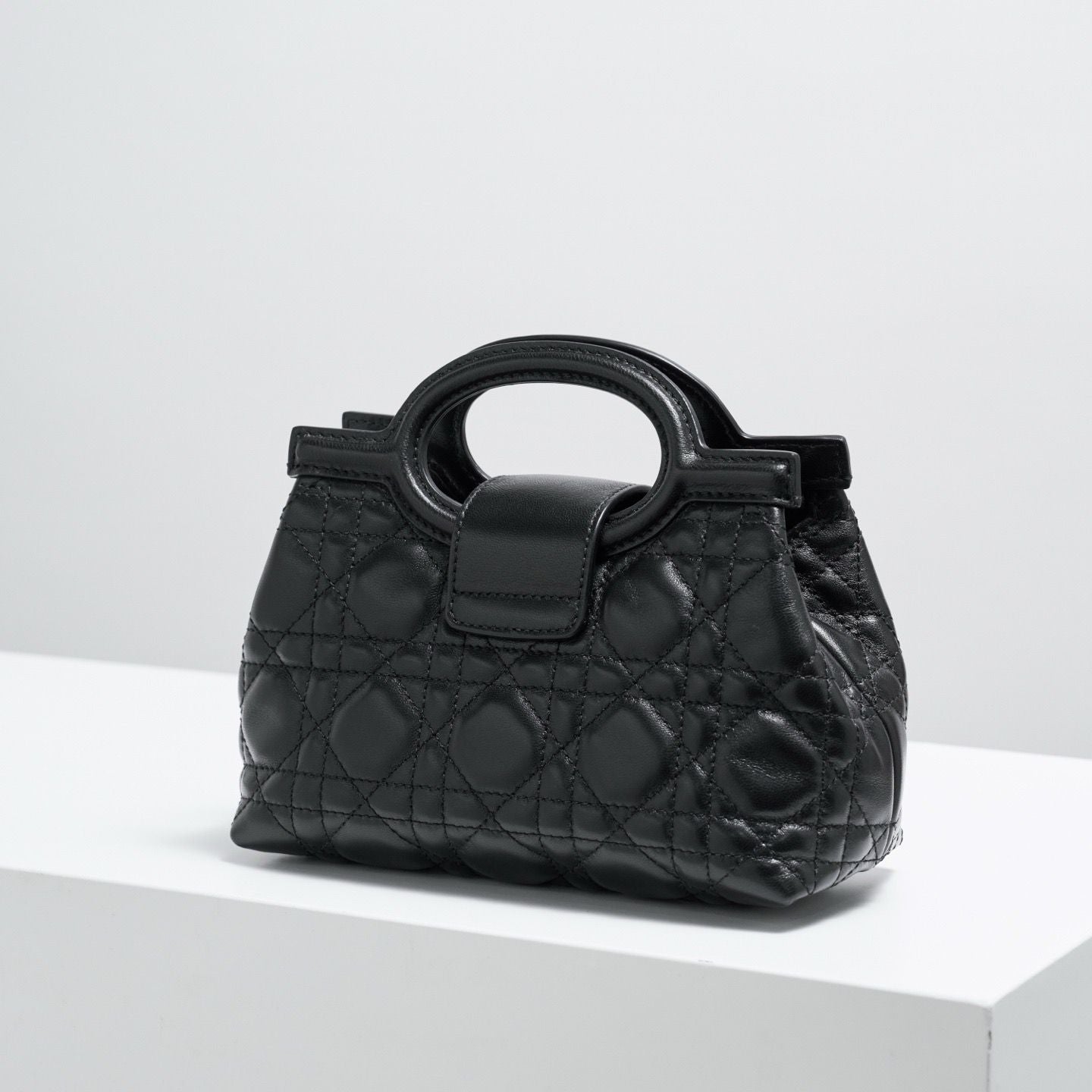 Jolie top handle mini bag