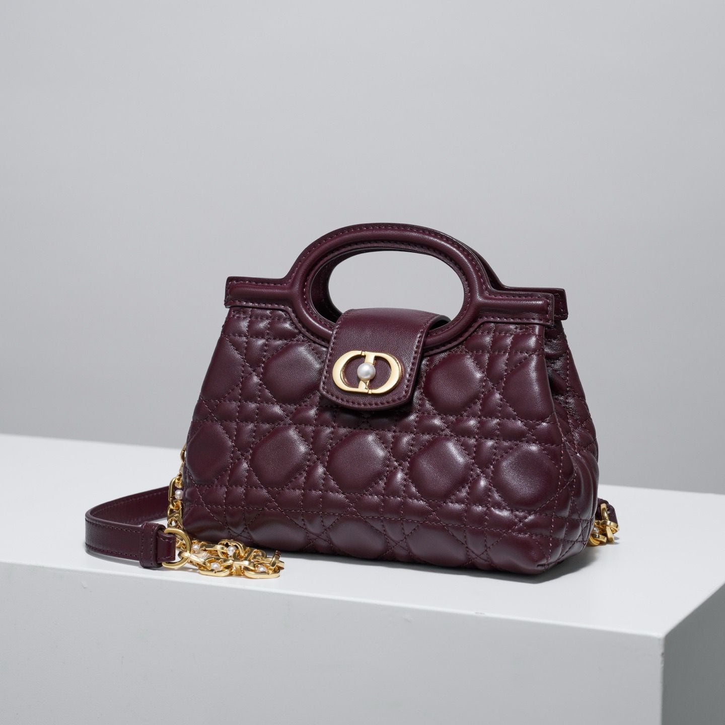Jolie top handle mini bag
