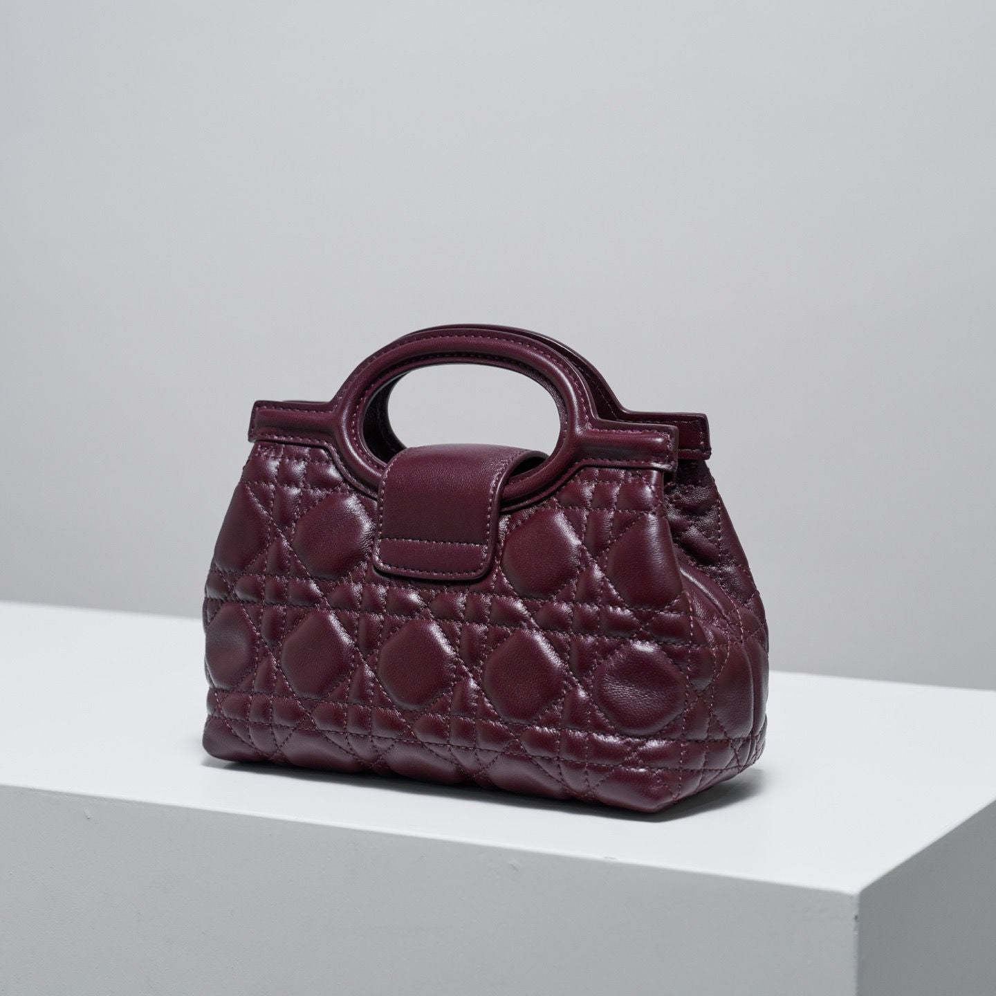 Jolie top handle mini bag